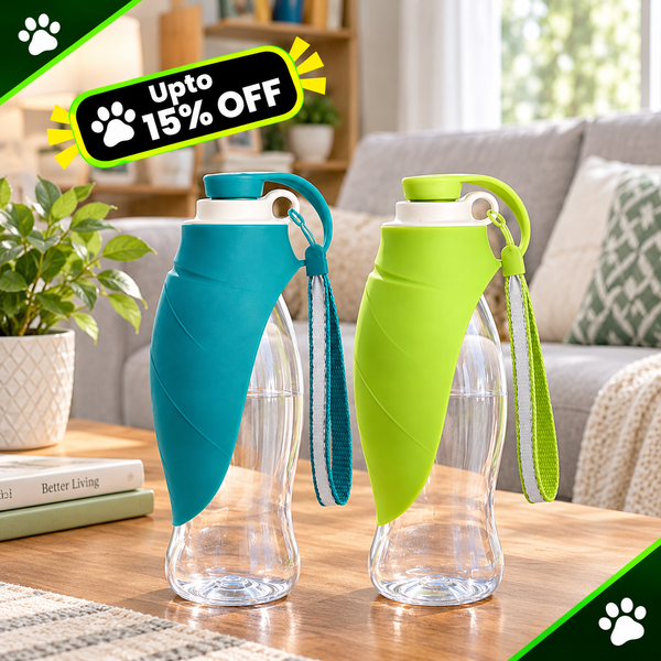 Two reusable water bottles with clear bodies and bright silicone covers, one teal and one lime green, displayed on a wooden table in a living room setting. A promotional badge reading 'Upto 15% OFF' is visible in the top left corner.