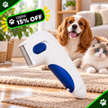 A pet grooming brush with a white body and blue handle is shown in a living room setting with a dog and cat in the background. A green promotional badge in the top left says 'Upto 15% OFF'.