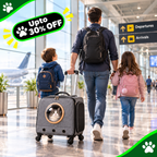 A man, a boy, and a girl walk through an airport terminal, with the man pulling a gray pet suitcase that has a round window showing a cat inside. The scene includes promotional graphics with paw prints and the text 'Upto 30% OFF'.