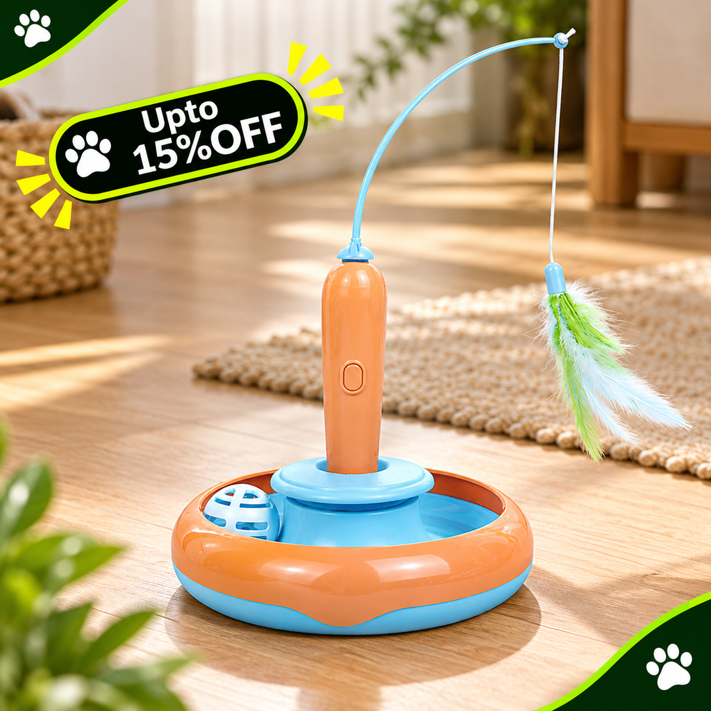 An electric pet toy with a circular orange and blue base, a flexible blue wand, and a feather attachment, shown on a wooden floor in a home setting with a 'Upto 15% OFF' promotional badge.