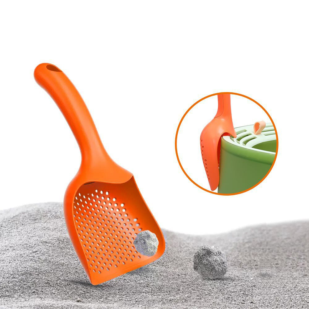Orange cat litter scoop on a bed of cat litter with a close-up inset showing the scoop's design.